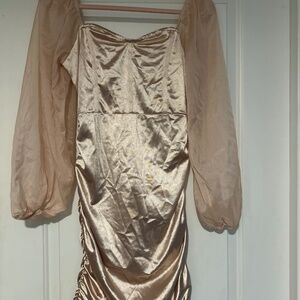 Tight fitted rose gold/champagne dress